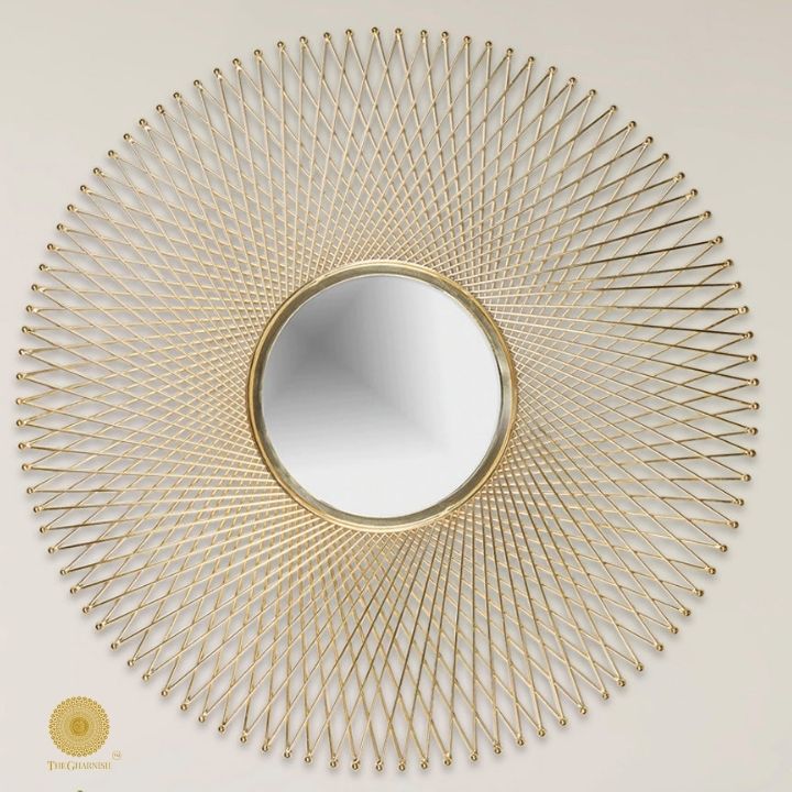 Metallic sticks wall mirror by TheGharnish, 30-inch diameter decorative wall mirror with a modern metallic frame.