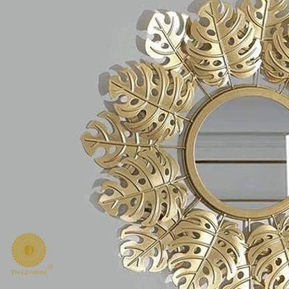 Spectacular metallic leaf wall mirror by TheGharnish, 24-inch decorative wall mirror with intricate leaf design.