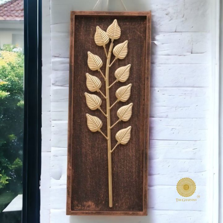 Wooden wall art featuring a leaf design in a natural wooden frame, measuring 8x20 inches, ideal for wall decor.