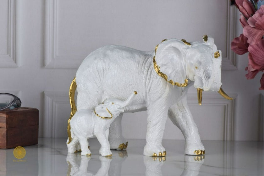 Black elephant with baby elephant animal figurines by TheGharnish, detailed and realistic decorative sculpture.
