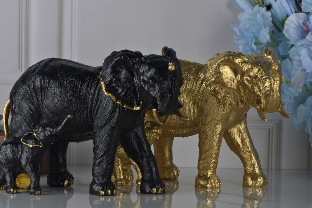 Black elephant figurine with a baby elephant, detailed animal figurines by TheGharnish, showcasing a realistic animal sculpture.