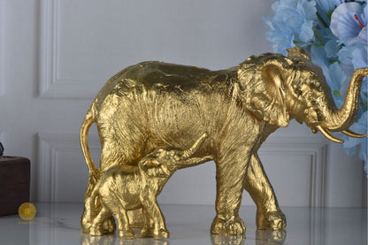 Black elephant figurine with baby elephant from TheGharnish animal figurines collection, showcasing detailed animal sculpture.