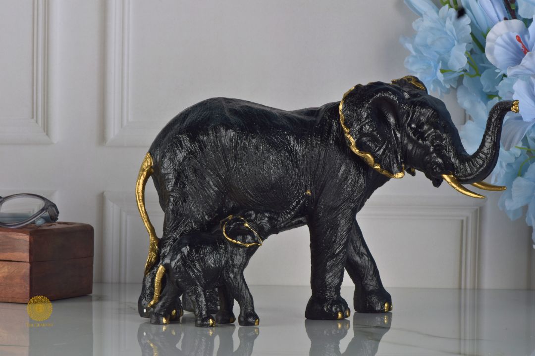 Black elephant figurine with a baby elephant, detailed animal sculpture by TheGharnish, showcasing realistic features and craftsmanship.