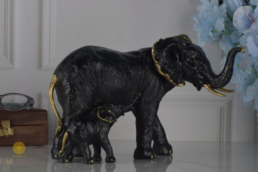 Black elephant figurine with a baby elephant, detailed animal figurine by TheGharnish, showcasing realistic elephant design.