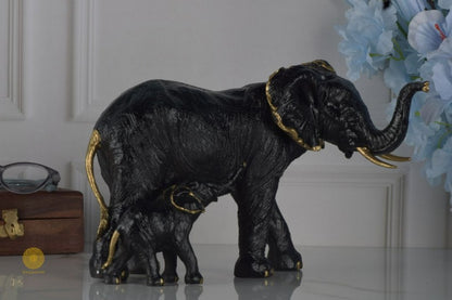 Black elephant figurine with a baby elephant, detailed animal figurine by TheGharnish, showcasing realistic elephant design.