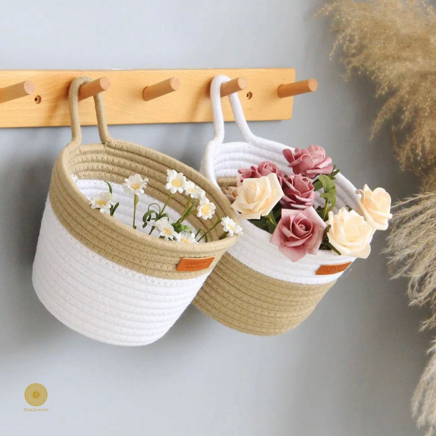 White and brown wall hanging basket by TheGharnish, with a woven design, perfect for storage or decorative display.