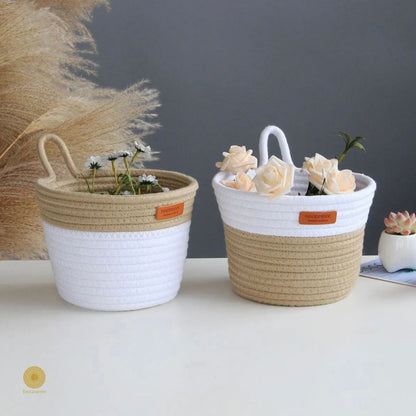 White and brown wall hanging basket by TheGharnish, featuring a woven basket design for decorative storage.