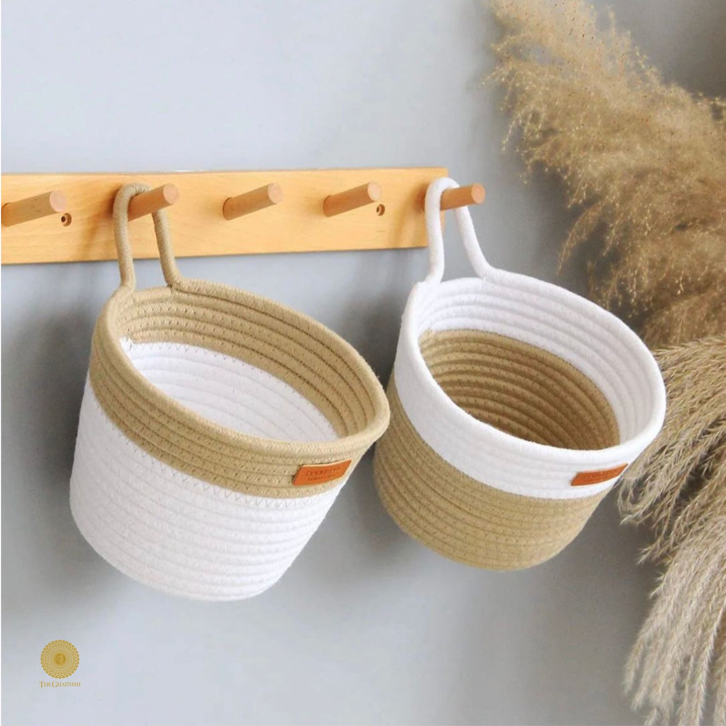 White and brown wall hanging basket by TheGharnish with a woven design for storage or decorative use.