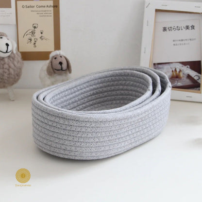 Set of three white storage organizer baskets from TheGharnish, ideal for decluttering and organizing household items.