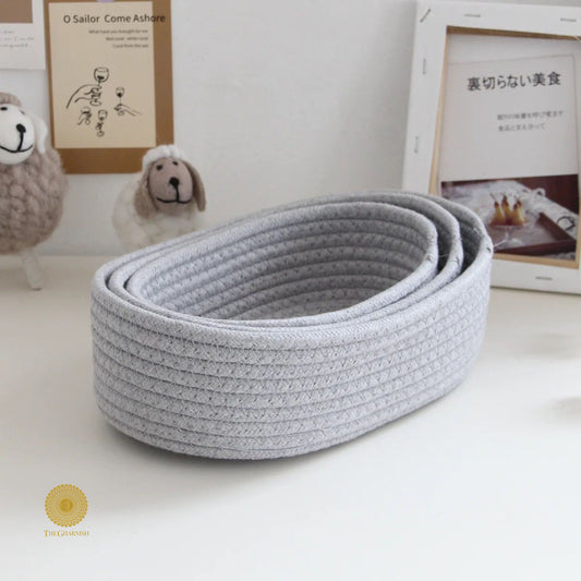 Set of three white storage organizer baskets from TheGharnish, ideal for decluttering and organizing household items.