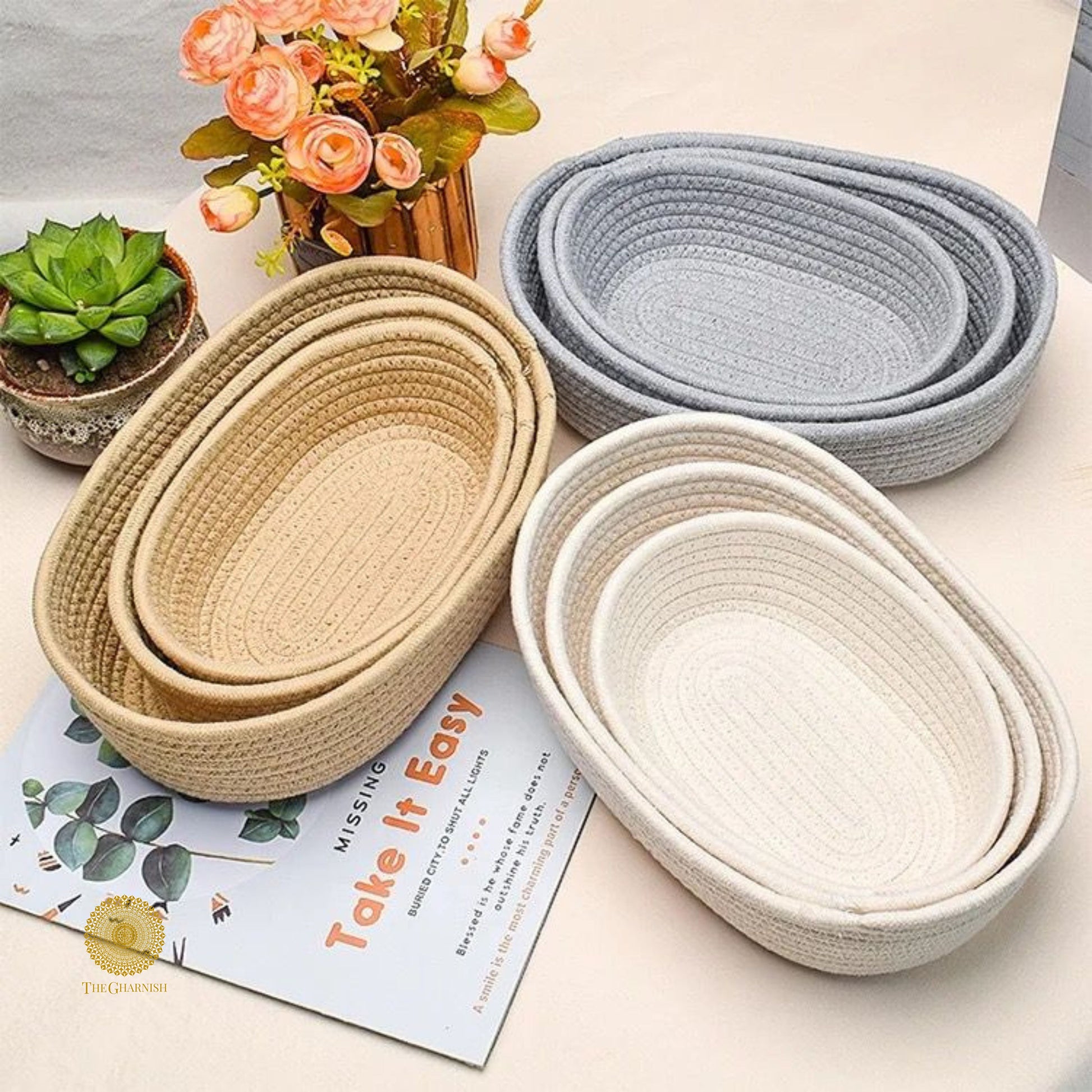 Set of three white storage organizer baskets by TheGharnish, ideal for organizing household or office spaces.