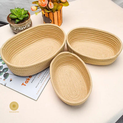 Set of three white storage organizer baskets by TheGharnish, ideal for organizing shelves or closets.