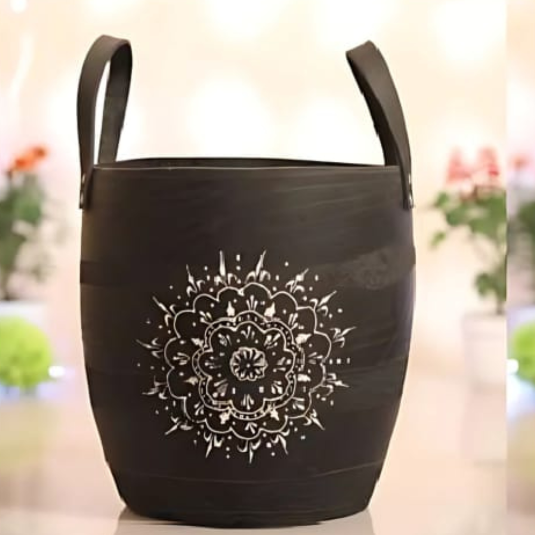 Black premium rubber planter from TheGharnish with a smooth finish and rounded shape, suitable for indoor or outdoor plant display.