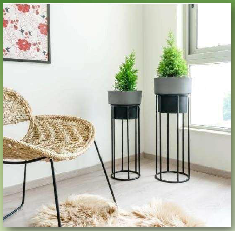 Set of 2 TheGharnish planters with stands, 30 and 25 inches tall, featuring modern design and durable material.