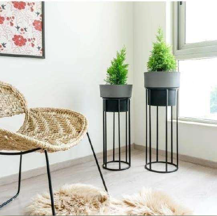 Set of 2 TheGharnish planters with stands, 30 and 25 inches tall, featuring modern design and sturdy bases for indoor or outdoor use.