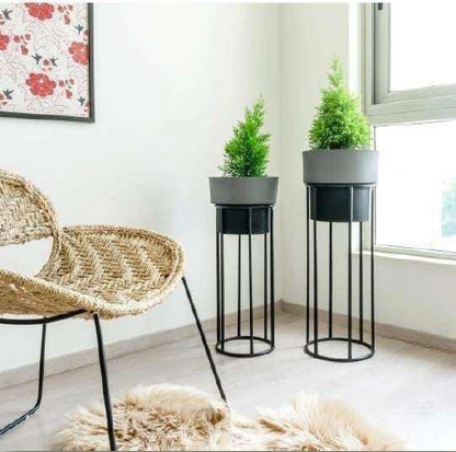 Set of 2 TheGharnish planters with stands, 30 and 25 inches tall, featuring modern design and sturdy bases for indoor or outdoor use.