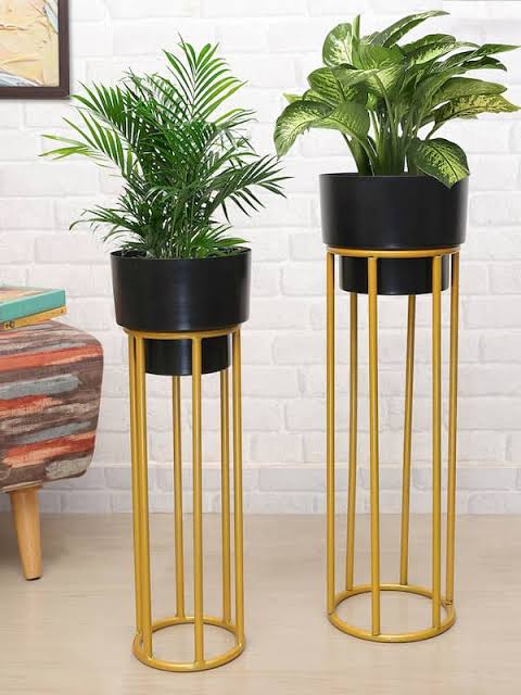 Set of 2 TheGharnish planters with stands, 30 and 25 inches tall, featuring modern ceramic designs for indoor or outdoor use.