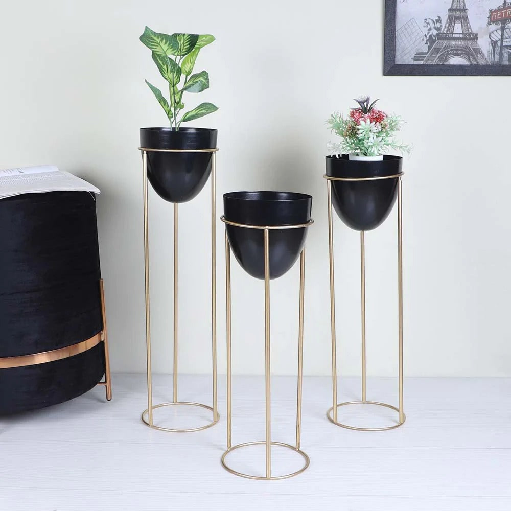 Set of 3 egg-shaped metallic planters in 26, 22, and 18 inches with a shiny finish, designed by TheGharnish.