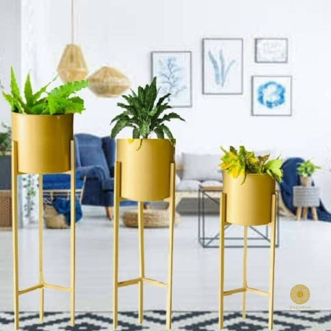Set of three white planters with matching stands in 33, 25, and 18 inches by TheGharnish, ideal for indoor or outdoor decor.