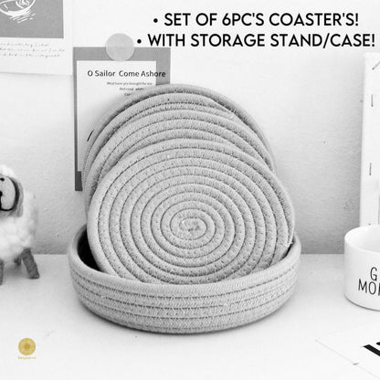 Set of six black storage containers with a coaster storage stand from TheGharnish for organized kitchen or bar use.