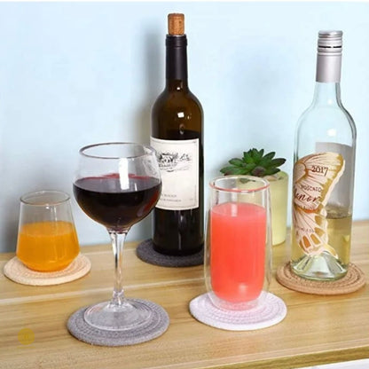 Set of six black storage containers with a coaster storage stand from TheGharnish, designed for organized coaster and accessory storage.