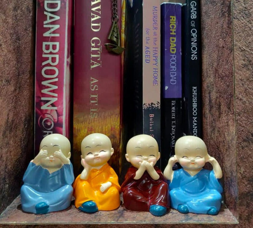Set of four Baby Monk table top decor showpieces by TheGharnish, featuring miniature monk figures for home decoration.
