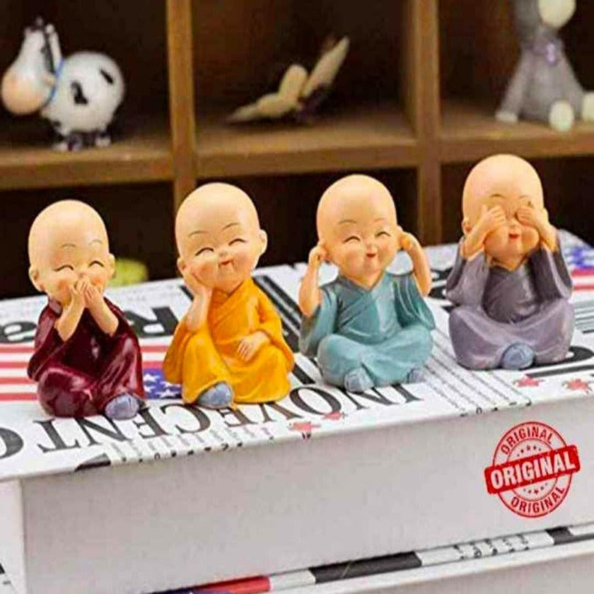 Set of four Baby Monk table top decor showpieces by TheGharnish, intricately crafted decorative figurines for home decoration.