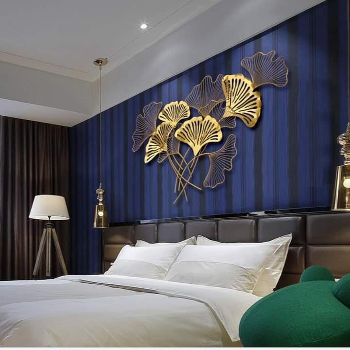 Golden iron leaf wall hanging art by TheGharnish, 48x24 inches, decorative metal wall decor with intricate leaf design.