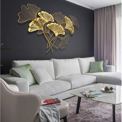 Golden iron leaf wall art hanging by TheGharnish, 48x24 inches, featuring intricate leaf design for decorative wall decor.