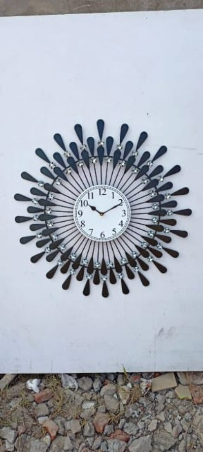 Black metallic Diamonds wall clock by TheGharnish, 24x24 inches, with a modern geometric design and bold diamond accents.
