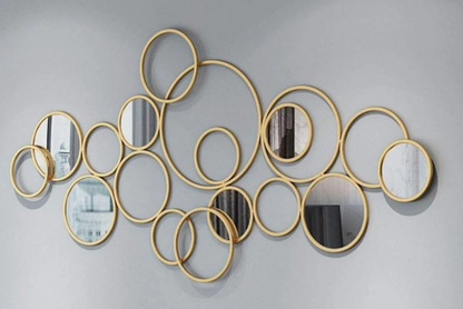 Bunch of Rings wall mirror by TheGharnish, 48x24 inches, featuring a decorative design with multiple circular frames.